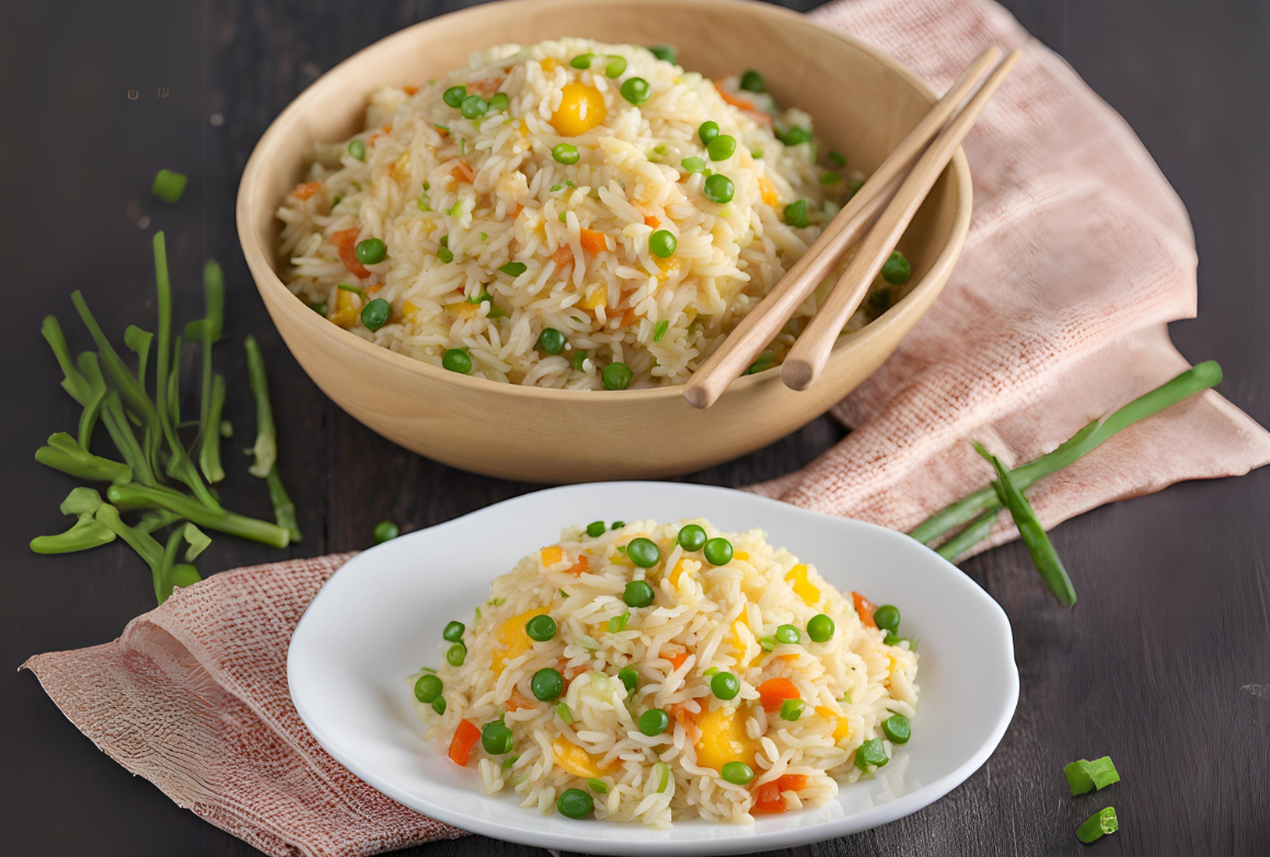 Microwave Egg Fried Rice is perfect for busy days. This simple recipe provides a tasty, nutritious meal in minutes. With minimal ingredients, you can create a flavorful dish that satisfies your hunger. Use leftover rice to save time and reduce waste. Fresh or frozen vegetables add color and nutrients. Eggs provide protein, making the dish balanced and filling. Season with soy sauce or your favorite spices for added flavor. Cooking in the microwave means less mess and faster cleanup. Ideal for lunch or dinner, this recipe is a must-try for anyone seeking a quick, delicious, and satisfying meal. Ingredients Needed Cooking Microwave Egg Fried Rice is a quick and easy way to enjoy a delicious meal. This recipe is perfect for busy people who want a healthy and tasty dish. All you need are some basic ingredients and a microwave. Let's dive into the ingredients needed for this delightful recipe. Rice Selection Choosing the right rice is very important for Microwave Egg Fried Rice. Long-grain rice works best because it stays fluffy and separate. Basmati rice and Jasmine rice are great choices. Avoid using sticky or short-grain rice as they can become mushy. Here are some tips for selecting the perfect rice: Use day-old rice for better texture. Rinse the rice to remove excess starch. Cook the rice thoroughly before using it. Using day-old rice ensures that the grains stay separate. Rinsing the rice helps to remove the excess starch which can make the rice sticky. Cooking the rice properly is crucial to avoid any raw or undercooked grains. Veggies And Proteins Adding veggies and proteins makes the fried rice more nutritious and flavorful. Common veggies include carrots, peas, and bell peppers. Proteins like eggs, chicken, and shrimp are popular choices. Here are some ideas for veggies and proteins: Veggies Proteins Carrots Eggs Peas Chicken Bell Peppers Shrimp Broccoli Tofu Chop the veggies into small pieces for even cooking. Cook the proteins separately before adding them to the rice. This ensures that everything is cooked well and tastes great. Seasonings And Sauces Seasonings and sauces are the key to flavorful fried rice. Soy sauce is a must-have ingredient. Sesame oil adds a nutty flavor. Garlic and ginger provide a delicious aroma. Here are some seasonings and sauces to consider: Soy sauce for saltiness. Sesame oil for a rich flavor. Garlic for aroma. Ginger for a spicy kick. Green onions for freshness. Mix the seasonings well to ensure even distribution. Avoid using too much sauce as it can make the rice soggy. A little goes a long way in enhancing the flavors. Credit: zoom.ocado.com Preparation Steps Microwave Egg Fried Rice is a delicious and quick meal. It's perfect for busy days. This dish combines the flavors of eggs, vegetables, and rice. You can make it in just a few minutes. Here are the preparation steps to make this yummy dish. Cooking Rice Start by cooking the rice. Use a microwave-safe bowl. Add one cup of rice and two cups of water. Microwave on high for 10 minutes. Stir the rice halfway through the cooking time. Check if the rice is tender. If not, microwave for another 2 minutes. Let the rice cool for a few minutes before using it. Here are the steps to cook rice perfectly: Rinse the rice with cold water. Use the right amount of water. Microwave on high for 10 minutes. Stir halfway through. Check for tenderness. Let it cool before using. Remember, well-cooked rice is the base for your dish. Make sure it is not too dry or too mushy. Chopping Ingredients Next, chop your ingredients. You will need vegetables and green onions. Dice the carrots and bell peppers into small pieces. Chop the green onions finely. Break two eggs into a bowl and whisk them. Here are the ingredients you need: Ingredient Quantity Carrots 1/2 cup, diced Bell Peppers 1/2 cup, diced Green Onions 2, chopped Eggs 2, whisked Having all ingredients ready makes cooking easier. It also ensures the dish cooks quickly. Mixing Components Now, mix all components. In a large microwave-safe bowl, add the cooked rice. Add the diced vegetables and green onions. Pour the whisked eggs over the rice and vegetables. Mix everything well. Here are the mixing steps: Place cooked rice in a large bowl. Add diced vegetables and green onions. Pour whisked eggs over the mix. Stir everything together. Microwave on high for 3-4 minutes. Stir halfway through to ensure even cooking. Once everything is mixed, microwave the dish on high for 3-4 minutes. Stir halfway through to ensure even cooking. Your Microwave Egg Fried Rice is now ready to enjoy. Microwaving Techniques Microwave Egg Fried Rice is a quick and easy meal. Microwaving techniques make it even simpler. With a few steps and some basic ingredients, you can enjoy a tasty dish. This guide will help you with cooking time, power settings, and stirring tips. Let's get started! Cooking Time Cooking time is crucial for Microwave Egg Fried Rice. You don't want to overcook or undercook it. The total cooking time usually ranges from 5 to 7 minutes. Here are some steps to follow: Prepare your ingredients. Mix rice, veggies, and oil in a microwave-safe bowl. Microwave for 3 minutes on high. Add eggs and stir well. Microwave for another 2-4 minutes. Keep an eye on the rice to avoid overcooking. Check after 5 minutes and adjust if needed. Microwave wattage can affect the cooking time. Higher wattage microwaves may cook faster. Power Settings Power settings are essential to get the right texture. Most microwaves have different power levels. For Microwave Egg Fried Rice, use the high power setting. This ensures the rice and eggs cook evenly. Here is a simple table to guide you: Power Level Cooking Time High (1000W+) 5-6 minutes Medium-High (700W-900W) 6-7 minutes Medium (500W-600W) 7-8 minutes Always check your microwave's manual for exact power levels. Adjust cooking times as needed. If the rice is not cooked through, microwave for another minute. Keep testing until it's perfect. Stirring Tips Stirring is key to even cooking. Stir the rice halfway through the cooking process. This helps to mix the flavors and ensures even cooking. Here are some tips: Use a fork to fluff the rice. Mix the ingredients well before microwaving. Stir again after adding the eggs. Stir one last time before serving. Do not skip stirring. It prevents the rice from clumping. Stir gently to avoid breaking the rice grains. Check the consistency after stirring. If it's too dry, add a splash of water or soy sauce. Credit: minuterice.com Serving Suggestions Microwave Egg Fried Rice is a quick and tasty dish. It's perfect for lunch or dinner. This meal is versatile and easy to make. With just a few ingredients, you can have a delicious meal in minutes. Let's explore some serving suggestions to enhance your experience. Garnishing Ideas Garnishing makes your dish look amazing. It adds color and flavor to your fried rice. Here are some easy ideas: Chopped green onions: Sprinkle them on top for a fresh taste. Sesame seeds: Add a bit of crunch and a nutty flavor. Fresh cilantro: It gives a burst of freshness to your dish. Crushed peanuts: These add a crunchy texture and a rich flavor. Sliced chilies: Perfect for those who love a spicy kick. Try mixing and matching these garnishes. It makes your Microwave Egg Fried Rice unique every time. Pairing Options Pairing your Microwave Egg Fried Rice with other dishes makes a complete meal. Here are some great options: Spring rolls: These crispy rolls complement the soft rice well. Steamed vegetables: A healthy side that adds balance to your meal. Chicken skewers: These add protein and a bit of smoky flavor. Soup: A warm bowl of soup pairs wonderfully with fried rice. Dumplings: These bite-sized treats are a great addition. These pairings make your meal more enjoyable and satisfying. Experiment to find your favorite combinations. Storage Tips Leftovers are great for another meal. Proper storage keeps your Microwave Egg Fried Rice fresh. Here are some tips: Use airtight containers: This helps keep the rice moist and prevents drying. Refrigerate: Store in the fridge if you plan to eat within 3 days. Freeze: For longer storage, freeze the rice for up to a month. Label the container: Write the date on it to keep track of freshness. To reheat, sprinkle a bit of water on the rice. Then, microwave it for a couple of minutes. This keeps the rice from becoming dry. Enjoy your Microwave Egg Fried Rice anytime! Credit: dormroomcook.com Frequently Asked Questions How Long To Cook Egg Fried Rice? Microwave for 5-6 minutes, stirring halfway. Ensure eggs are fully cooked. Can You Microwave Raw Eggs? Yes, beat eggs before microwaving. Stir frequently to prevent overcooking. What Ingredients For Microwave Egg Fried Rice? You'll need rice, eggs, veggies, soy sauce, and oil. Add seasonings to taste. Is Microwave Egg Fried Rice Healthy? Yes, it's nutritious with vegetables and protein. Control oil and salt for a healthier option.